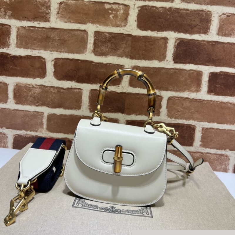 G*u*i top handle bags